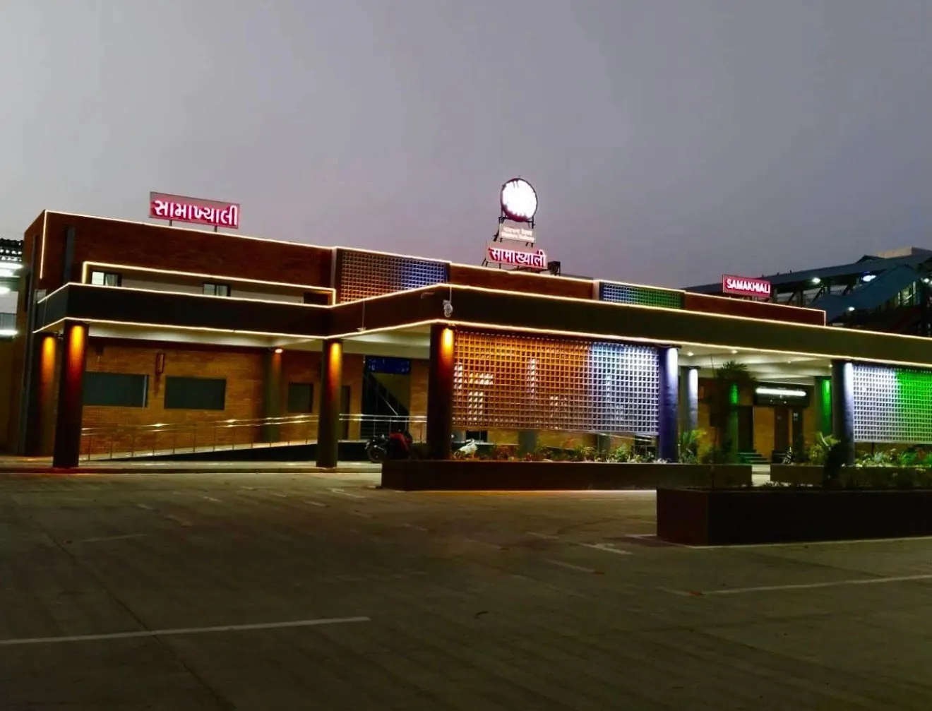 Shyamakhali railway station facade lit at night